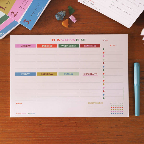 A4 weekly planner pad in colourful Work Hard Play Nice design