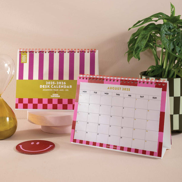 Front cover of the 2025–2026 Academic Desk Calendar – Flip August Start design with bold, colourful abstract artwork, printed on 100% recycled paper