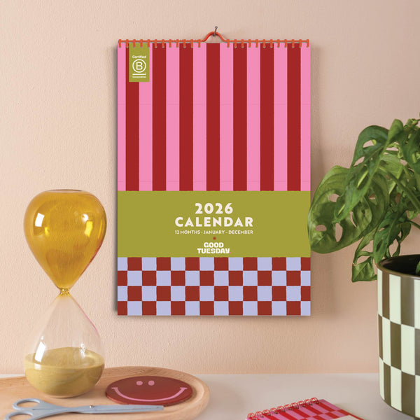 2026 wall calendar with red and pink striped and checkered design, Sunday start, 12 months January to December