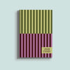 A split-design A5 diary cover for 2026. The top half features vertical stripes in olive green and light green, while the bottom half has vertical stripes in dark pink and light purple. A light green rectangular box on the bottom right says "2026 DIARY" in dark pink text.