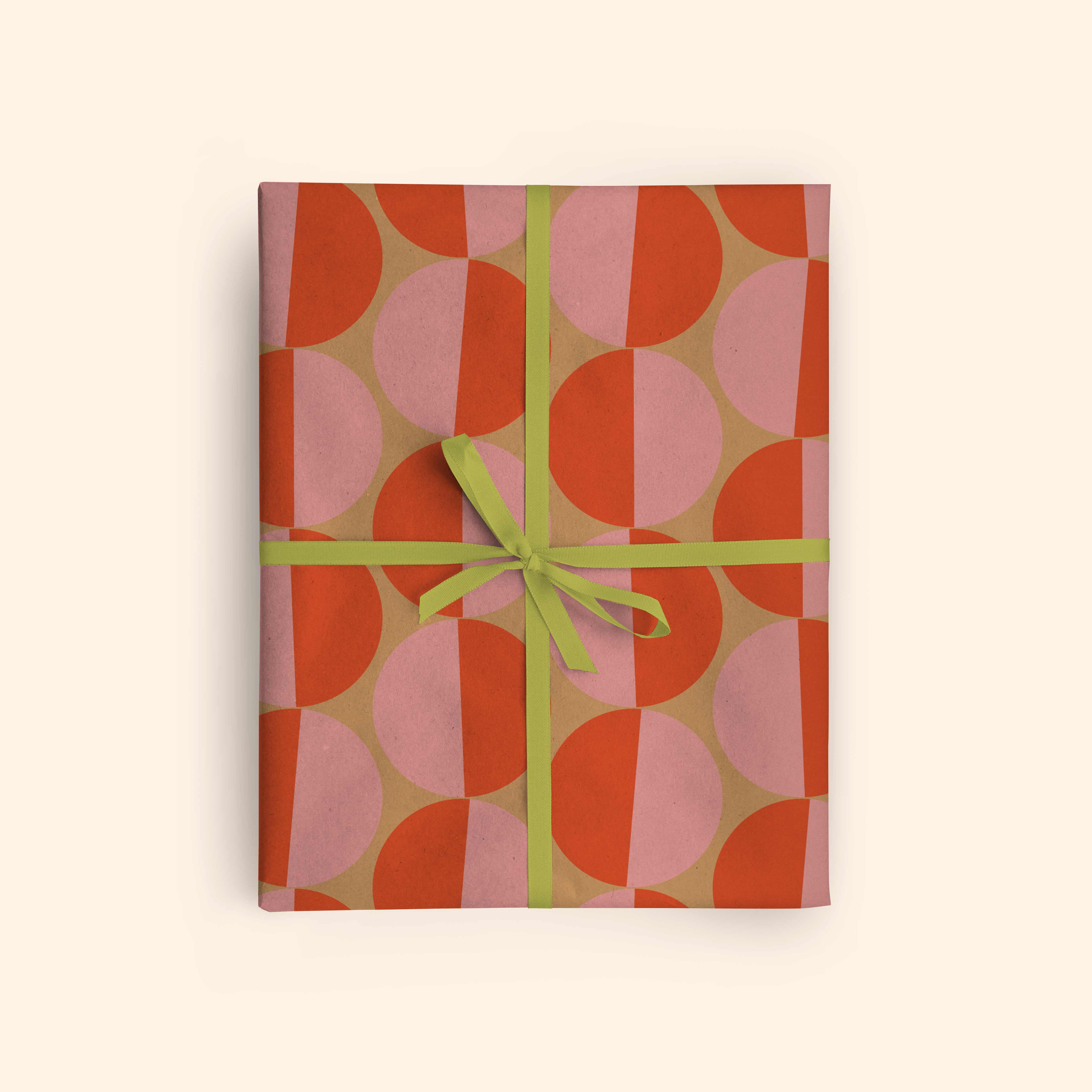 Good Tuesday's Peach Sunsets recycled wrapping paper, beautifully displayed as eco-friendly gift wrap, designed and made in the UK for sustainable gifting.