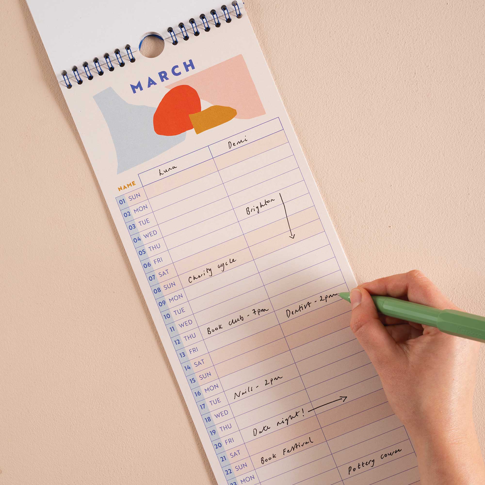 2026 Couples Calendar, oranges, reds and peach colour scheme. Column for each person. 