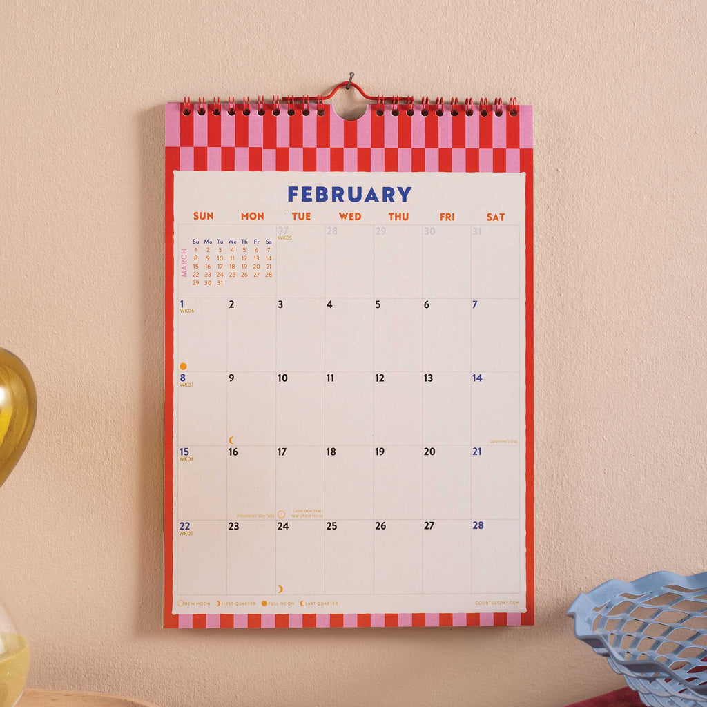2026 Wall calendar for February with a red and white checkered border.