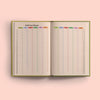 A vibrant 2026 year planner open to show all twelve months. Each month is laid out in columns, with days of the week and dates, allowing for a full overview of the year.