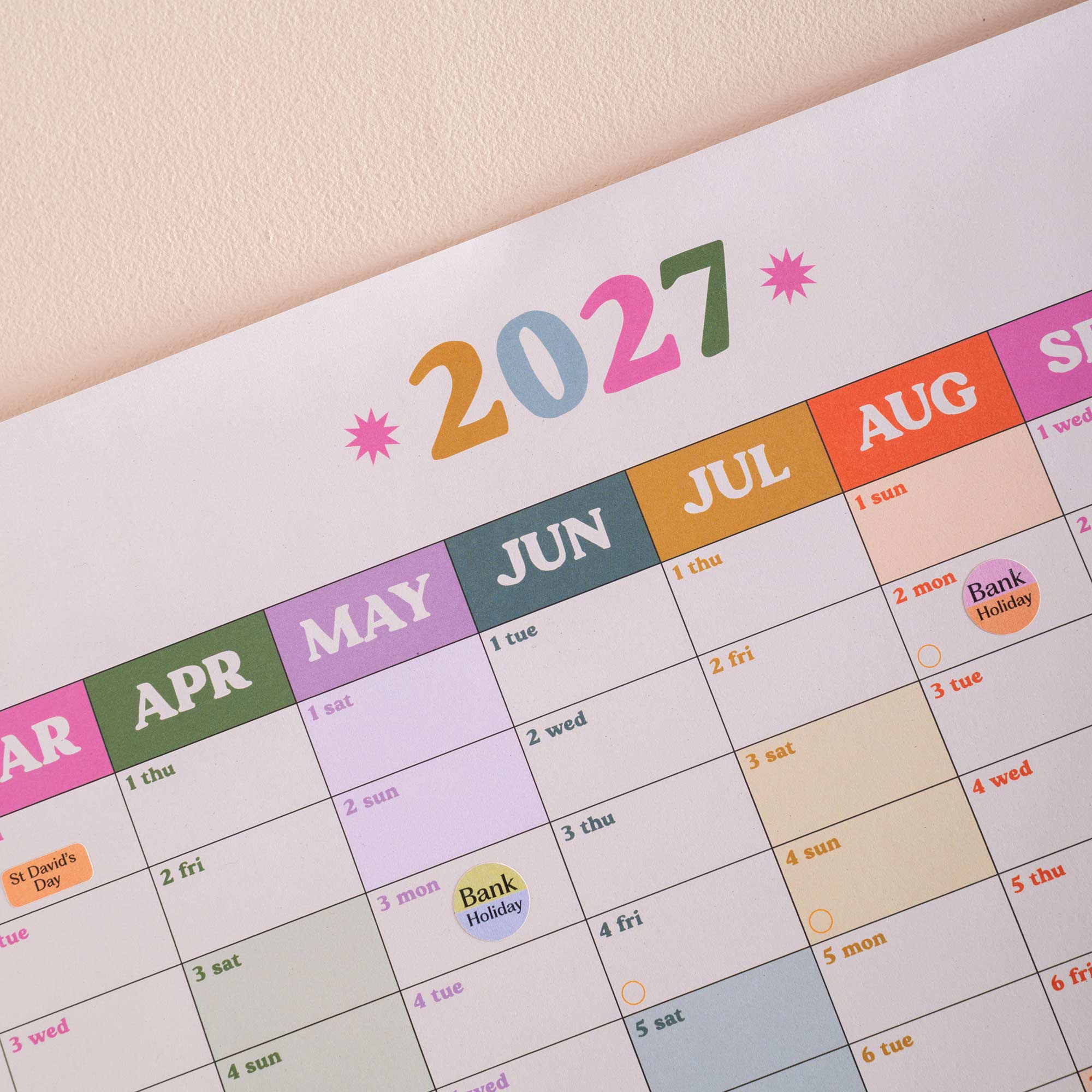 Good Tuesday's Calendar for the year 2027 with colorful month labels. 100% Recycled paper. Bcorp Certified. 