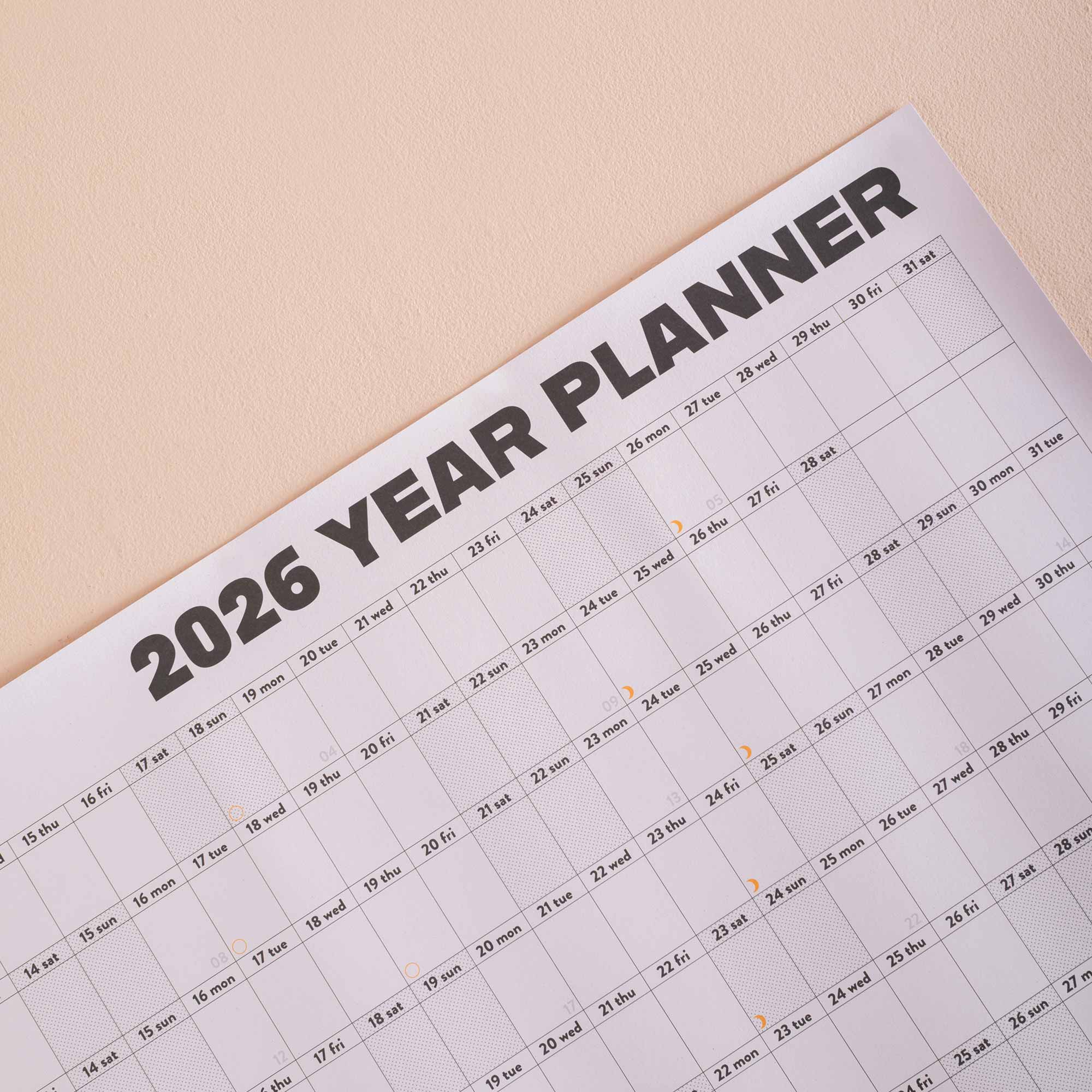 Close up of Good Tuesday's 2026 black and white landscape wall planner. 100% Recycled paper. 
