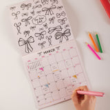 Calendar with decorative bows, for colouring in. Showing the month of March.