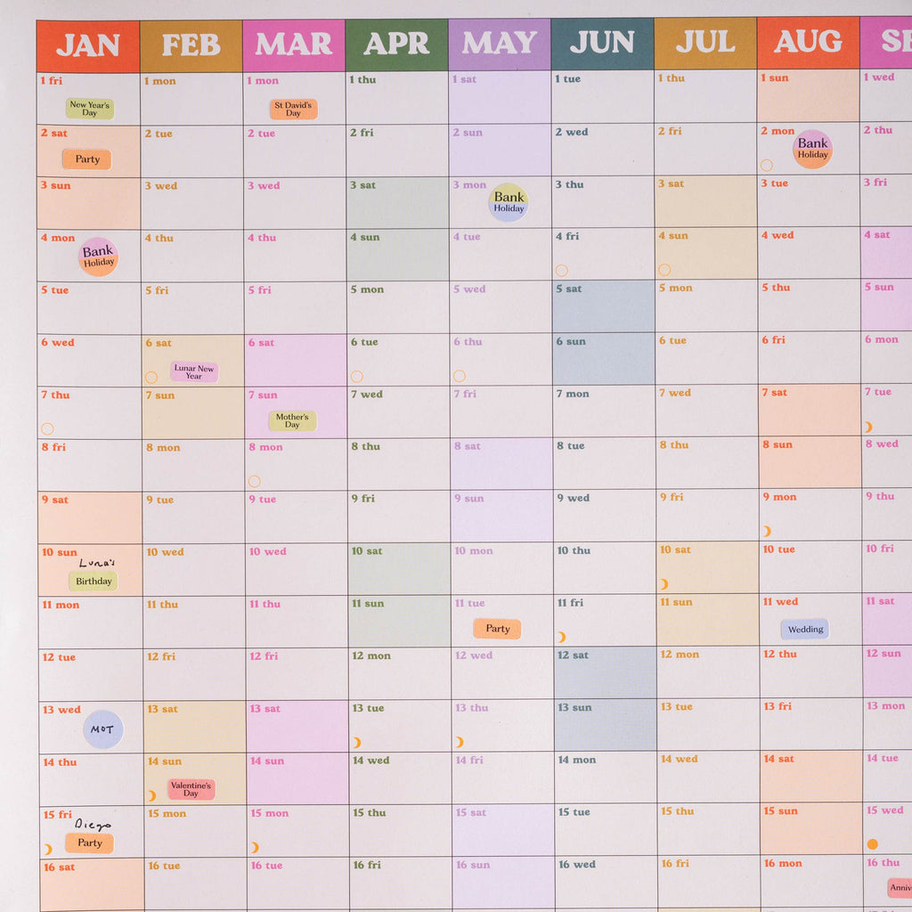 Good Tuesday's 2027 Multicolored calendar with various events and dates marked. Generous boxes. 100% Recycled paper. Bcorp Certified. 