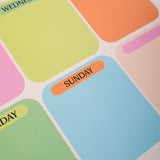 Good Tuesday's brightly coloured A4 weekly planner. Magnetic Fridge planner. Boxes for each week day and notes. Wipeable and reusable.