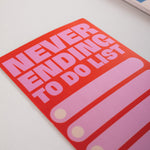 Good Tuesday's Never Ending to do list, magnetic fridge planner. Bold pink and red design. 