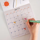 2026 Abstract Surrealist calendar.  Image showing the month of April. Calendar has well sized boxes to write in for each day. 