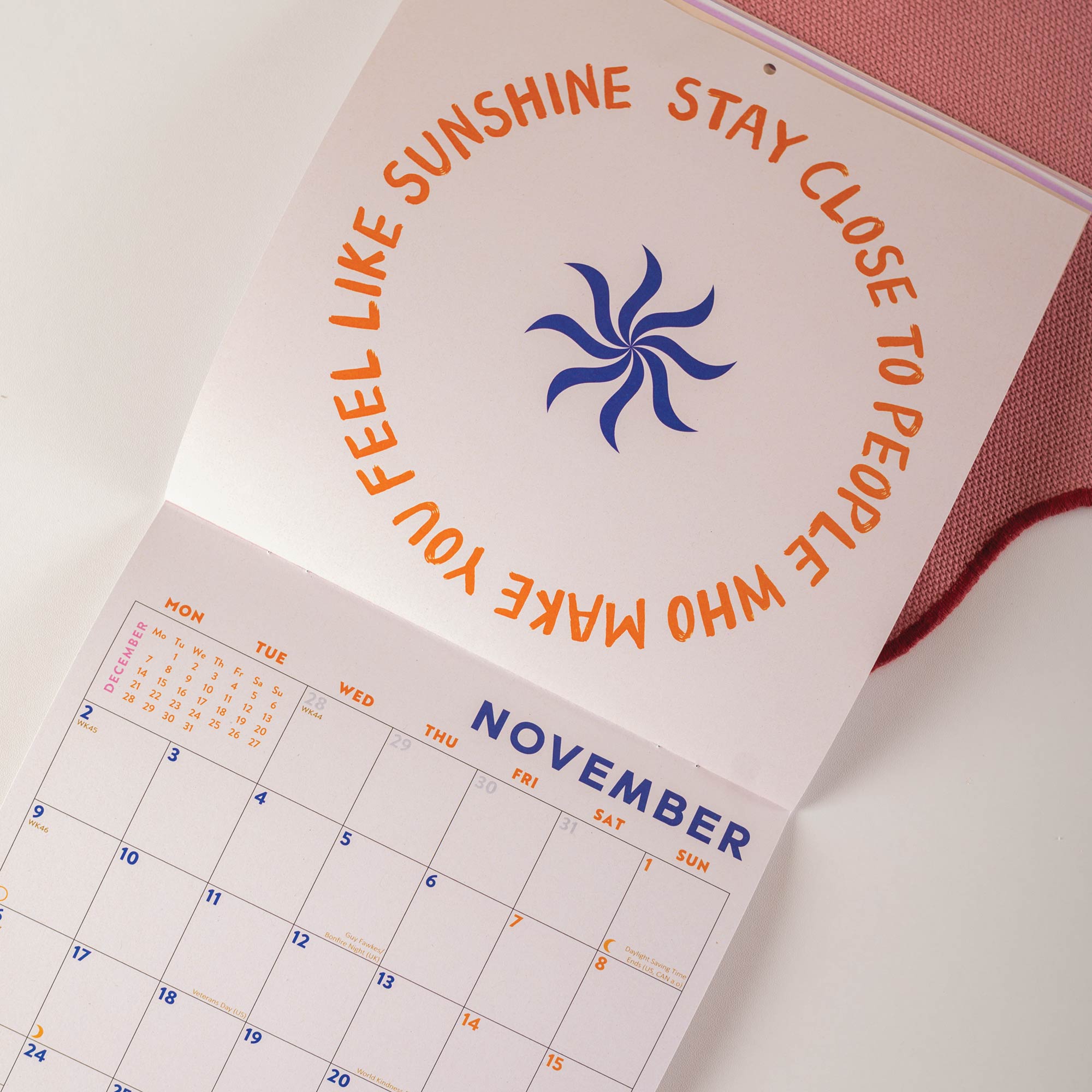 2026 Calendar page for November with motivational quote and sun graphic