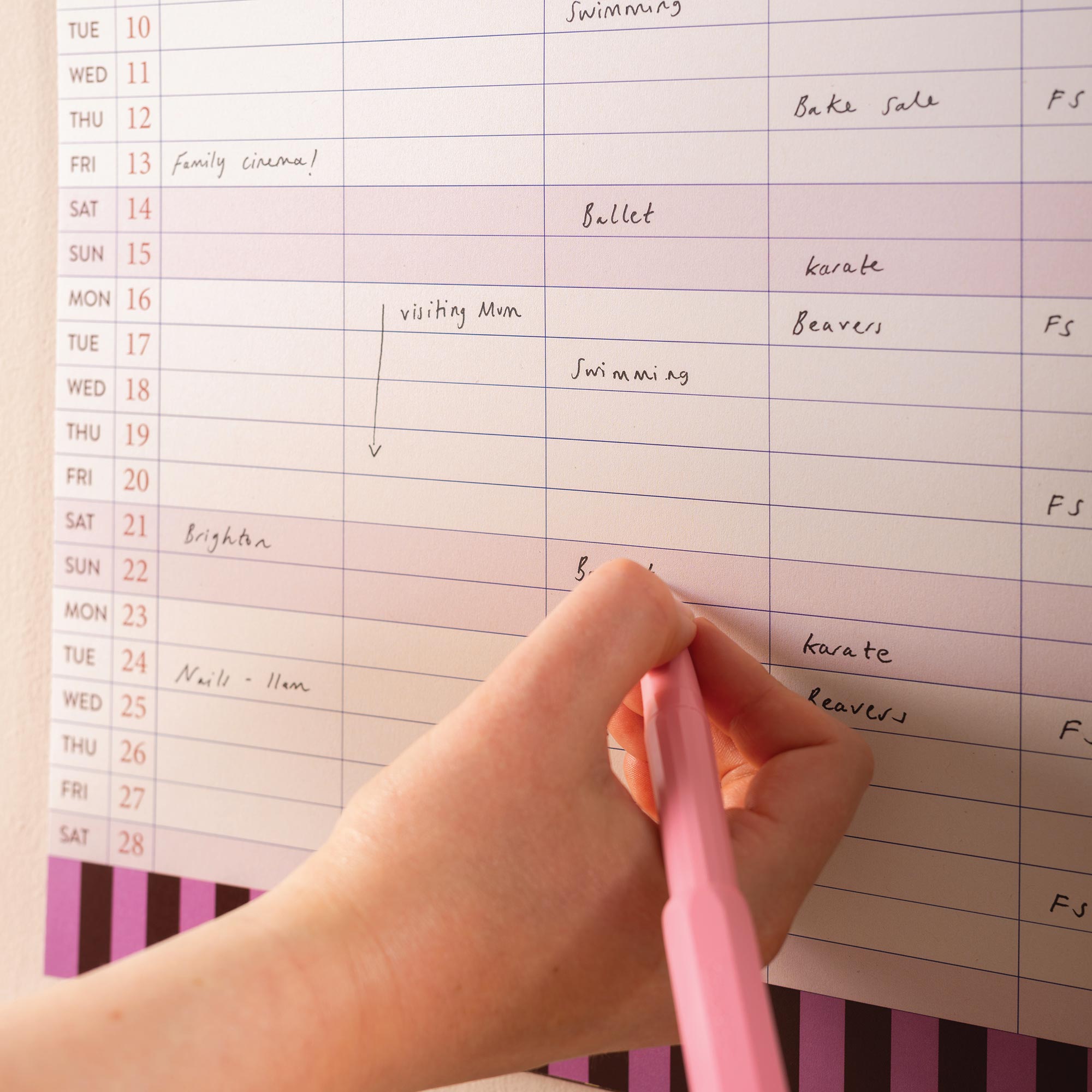 Handwriting in 5-column layout of academic family wall calendar