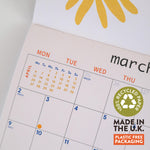 Calendar 2026 featuring a recycled paper and plastic-free packaging label.