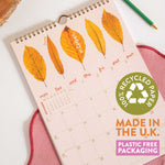 Calendar with leaf design and recycled paper.