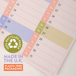 Good Tuesday, compact portrait 2026 wall planner, year view, in pastel colours, made on 100% recycled paper, made in the UK, plastic free packaging