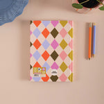 Harlequin pattern. Colourful diamond patterned 2026 Diary. Recycled Paper and Made in the UK. Plastic Free packaging. 
