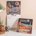 Good Tuesday 2026 Calendar with retro future spacescapes, fun, playful, designs 