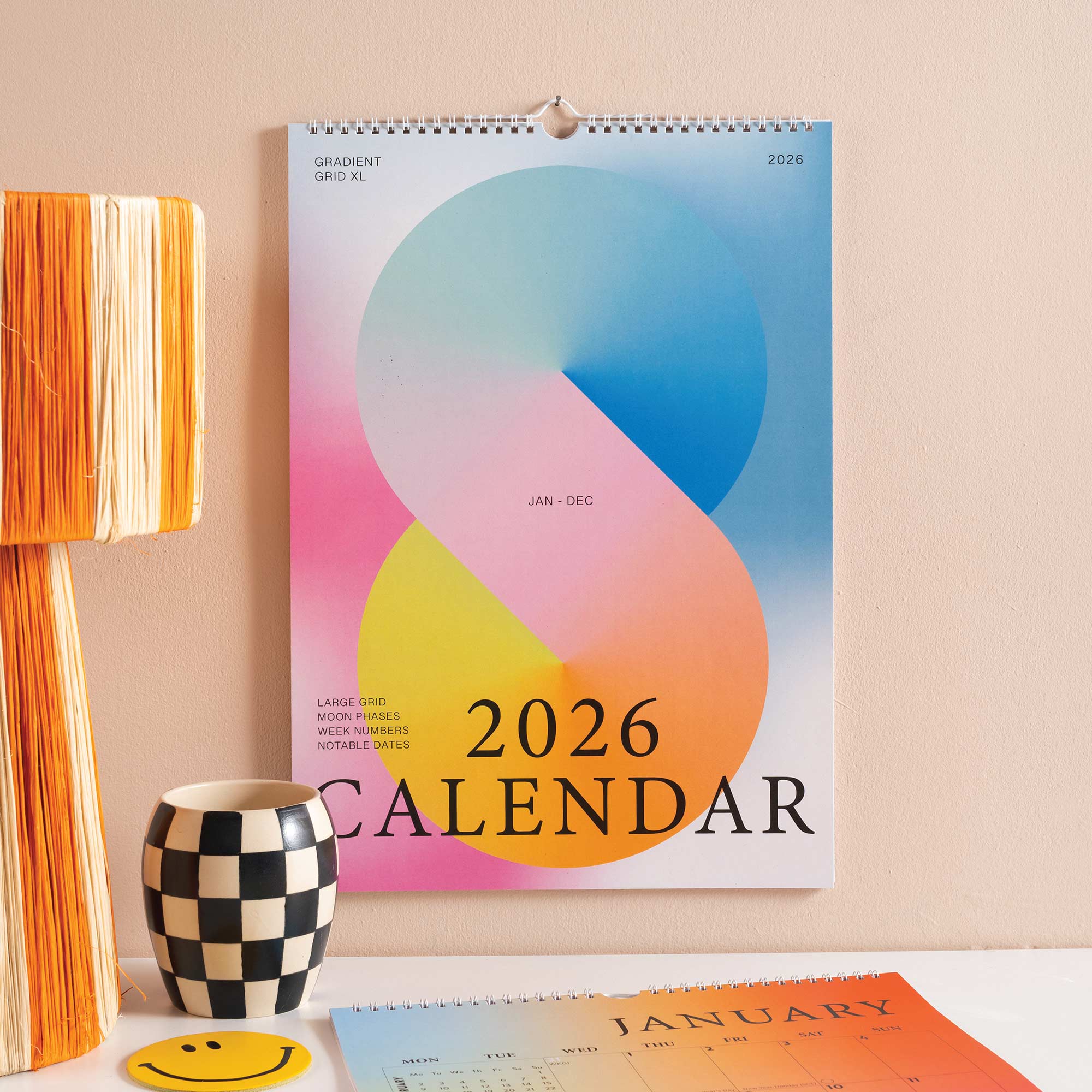 Good Tuesday's 2026 calendar with colorful gradient design. 100% recycled paper.