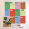 Large A3 undated monthly wall planner in Butter and Bold colour  palette with 12 separate monthly pages, showing 12 monthly pages arranged together on the wall