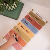 Wipeable weekly acrylic planner with spacious daily layout in an earthy colour palette