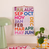 2026–2027 A4 mid year academic calendar in Simply Bright design hanging on wall
