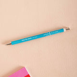 A vivid turquoise refillable ballpoint pen with a metal tip
