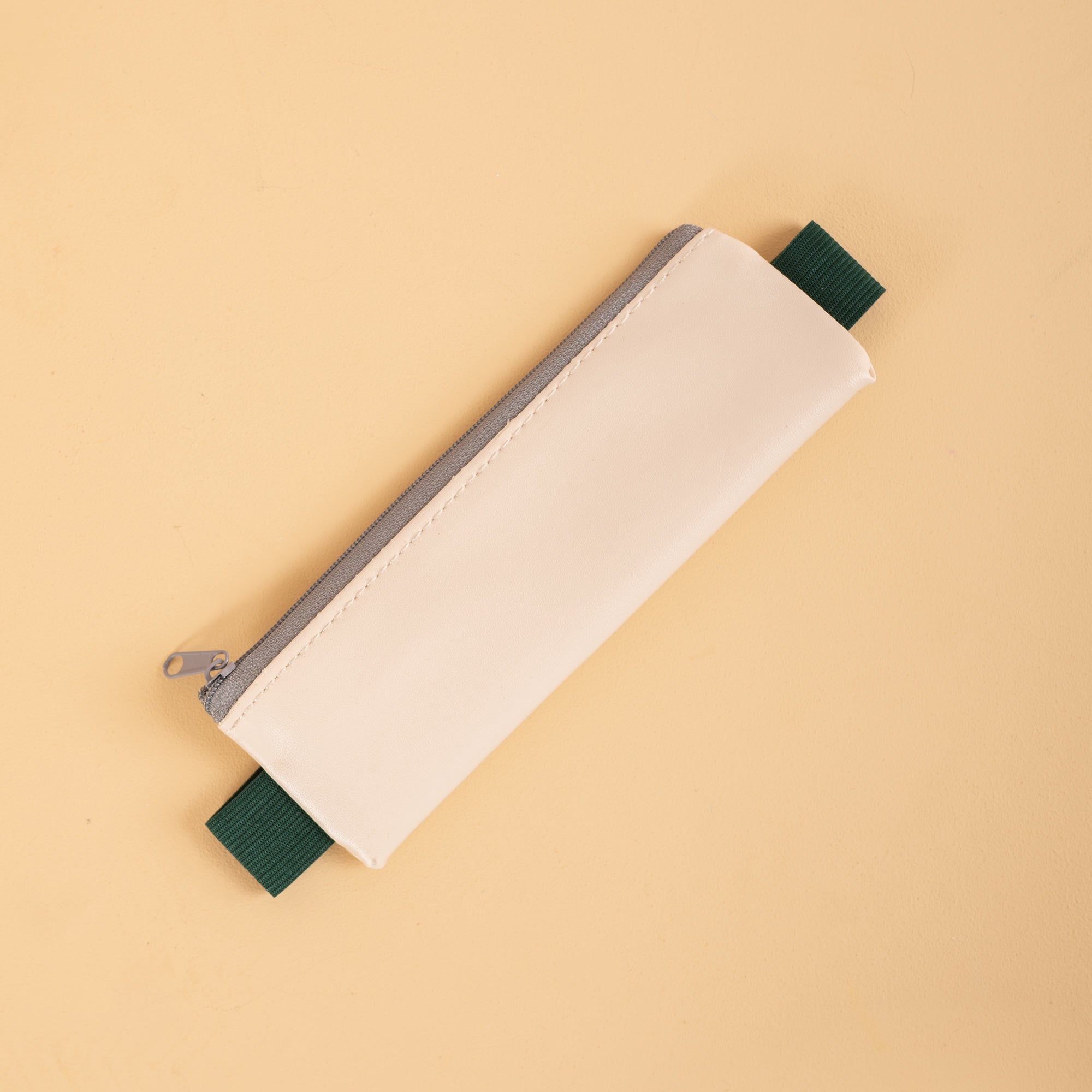 Kikkerland notebook pencil pouch in Cream, slim zip pouch for pens and pencils
