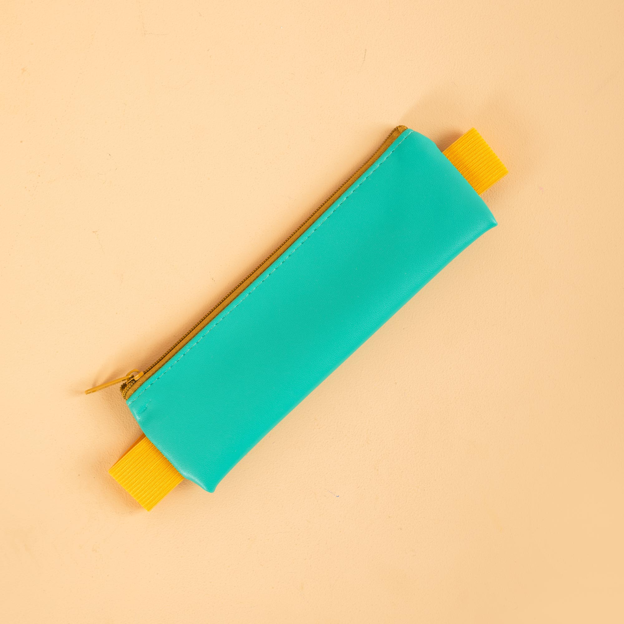 Kikkerland notebook pencil pouch in Turquoise, slim zip pouch for pens and pencils