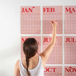 Large Monthly Undated A3 Wall Planner – 12 pink and red monthly pages being used.