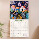Inside of the Folk Art Plantscapes 2026 calendar. Large monthly grid with week numbers, bank holidays, and lunar phases.