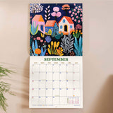 Inside of the Folk Art Plantscapes 2026 calendar. Large monthly grid with week numbers, bank holidays, and lunar phases.