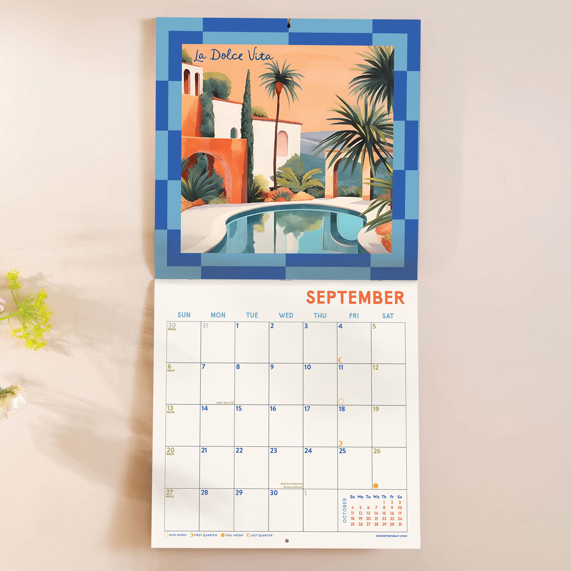 Inside of the La Dolce Vita 2026 calendar, showing the planner in use. Large monthly grid with week numbers, bank holidays, and lunar phases.