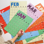 Butter &  Bold style undated A3 wall planner displayed on wall with muted colour palette