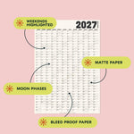 2027 Black & White wall planner with features highlighted: Moon phases, bleed-proof paper, matte paper, and highlighted weekends. 