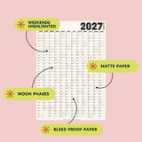 2027 Black & White wall planner with features highlighted: Moon phases, bleed-proof paper, matte paper, and highlighted weekends. 
