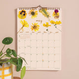 2027 wall calendar showing UK and US holidays moon phases and week numbers