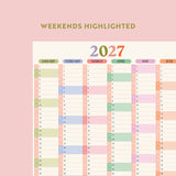 Compact pastel wall planner for 2027 with weekends highlighted on a pink background