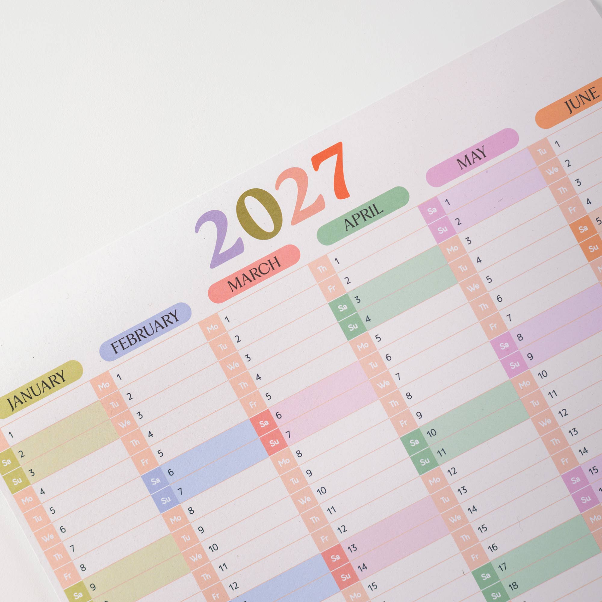 2027 Wall Planner with colourful month labels on a white background