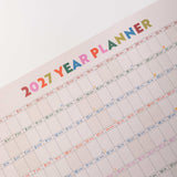 Up close imagery show 2027 Year Planner title.