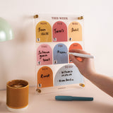 Earthy tone weekly planner styled in workspace for planning tasks, meal planning and appointments