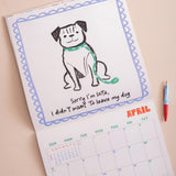 Month to view page of 2027 Dog Life calendar showing large date grid and dog artwork