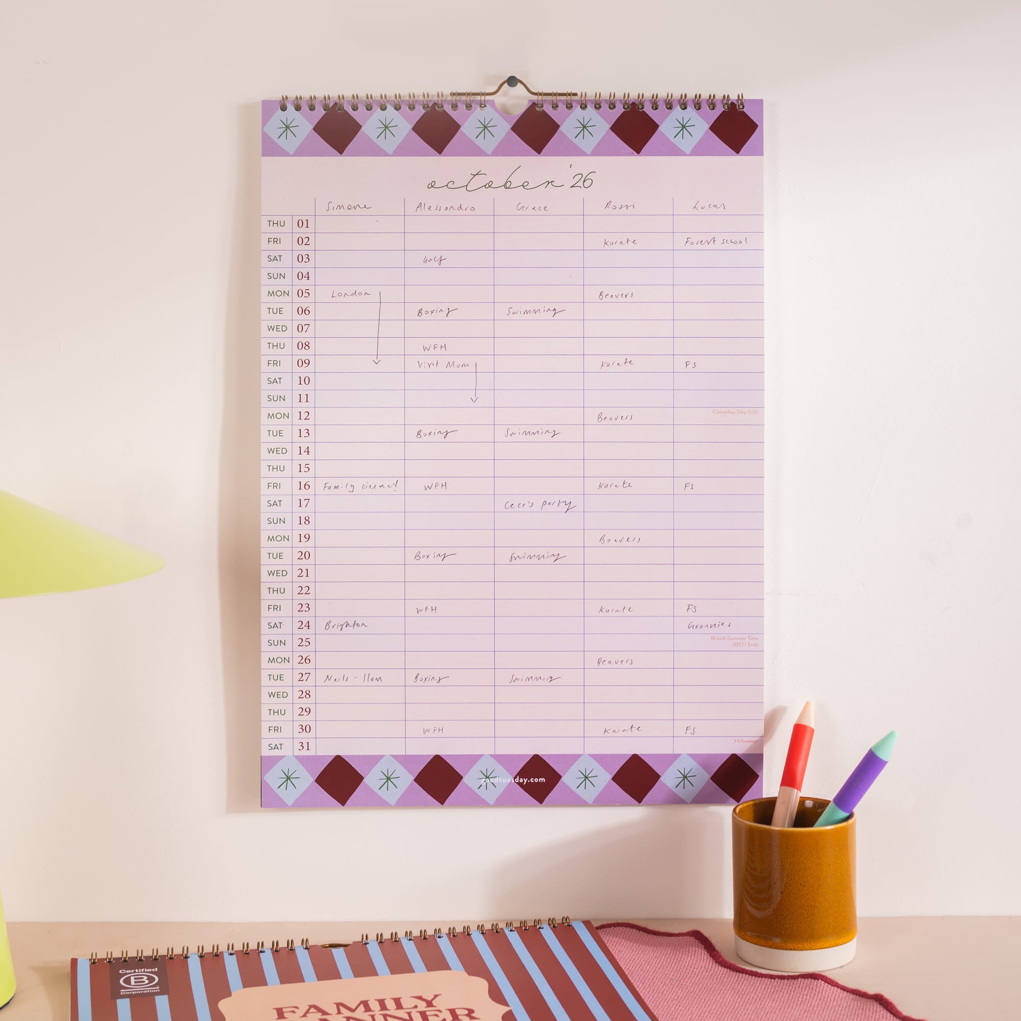 Boho circus family wall planner in use with school events and activities organised