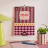 Boho Circus A4 mid year calendar 2026–2027 hanging on wall with colourful design