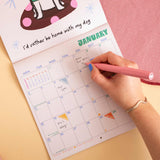 Dog Life wall calendar, month to view grid with dog illustrations