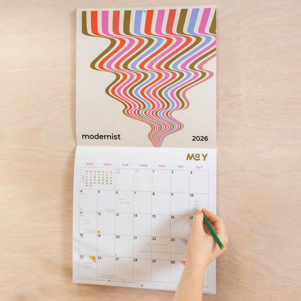Modernist 2026 calendar, showing the planner in use. Large monthly grid with week numbers, bank holidays, and lunar phases.