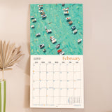 Inside of the Ocean Aerials 2026 calendar, showing the planner in use. Large monthly grid with week numbers, bank holidays, and lunar phases.