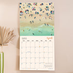 Inside of the Ocean Aerials 2026 calendar, showing the planner in use. Large monthly grid with week numbers, bank holidays, and lunar phases.