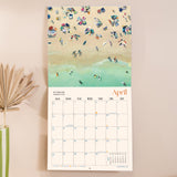 Inside of the Ocean Aerials 2026 calendar, showing the planner in use. Large monthly grid with week numbers, bank holidays, and lunar phases.