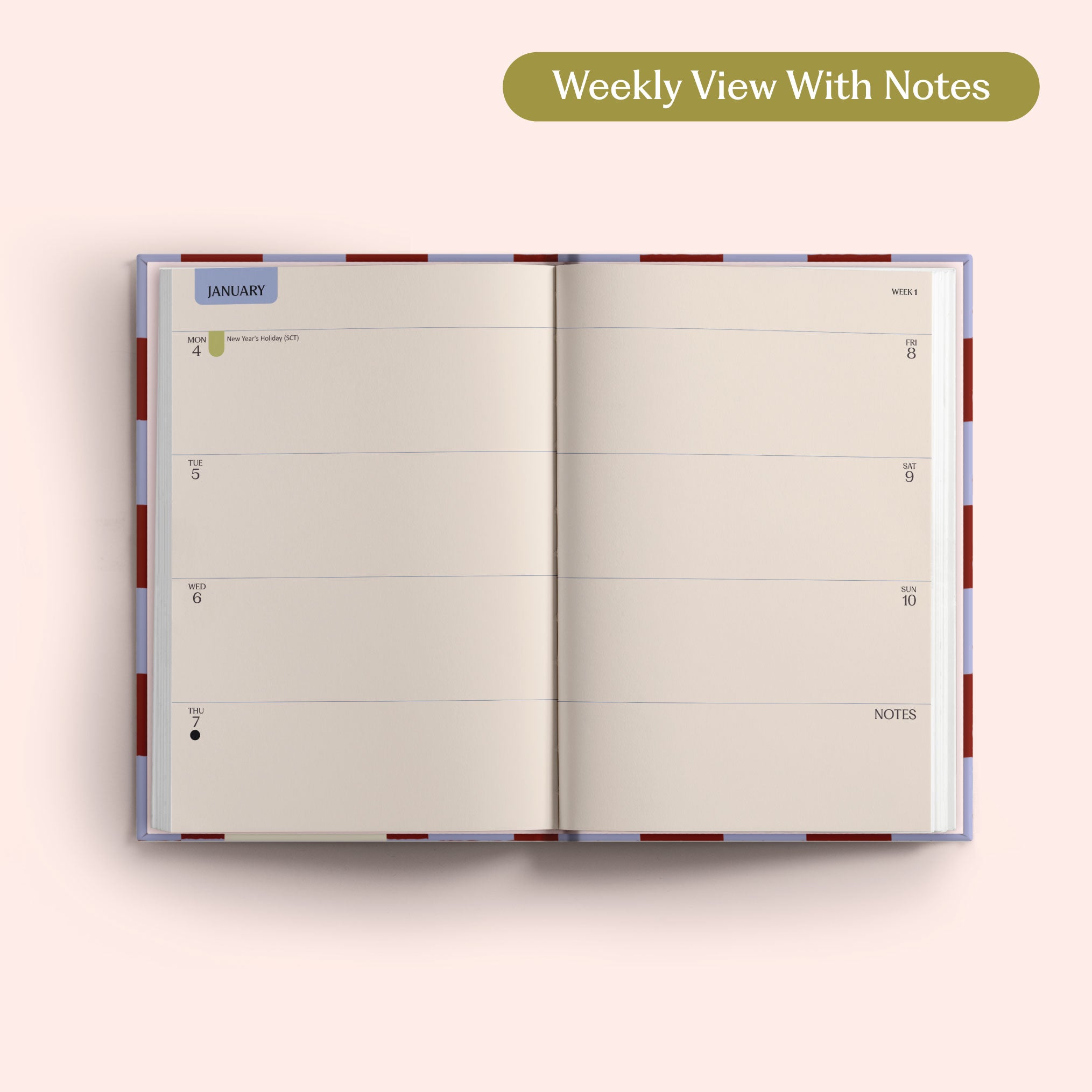 Open planner showing a weekly view with notes on a pink background. Recycled Paper.